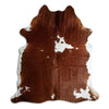 Brown and white cowhide rug XL