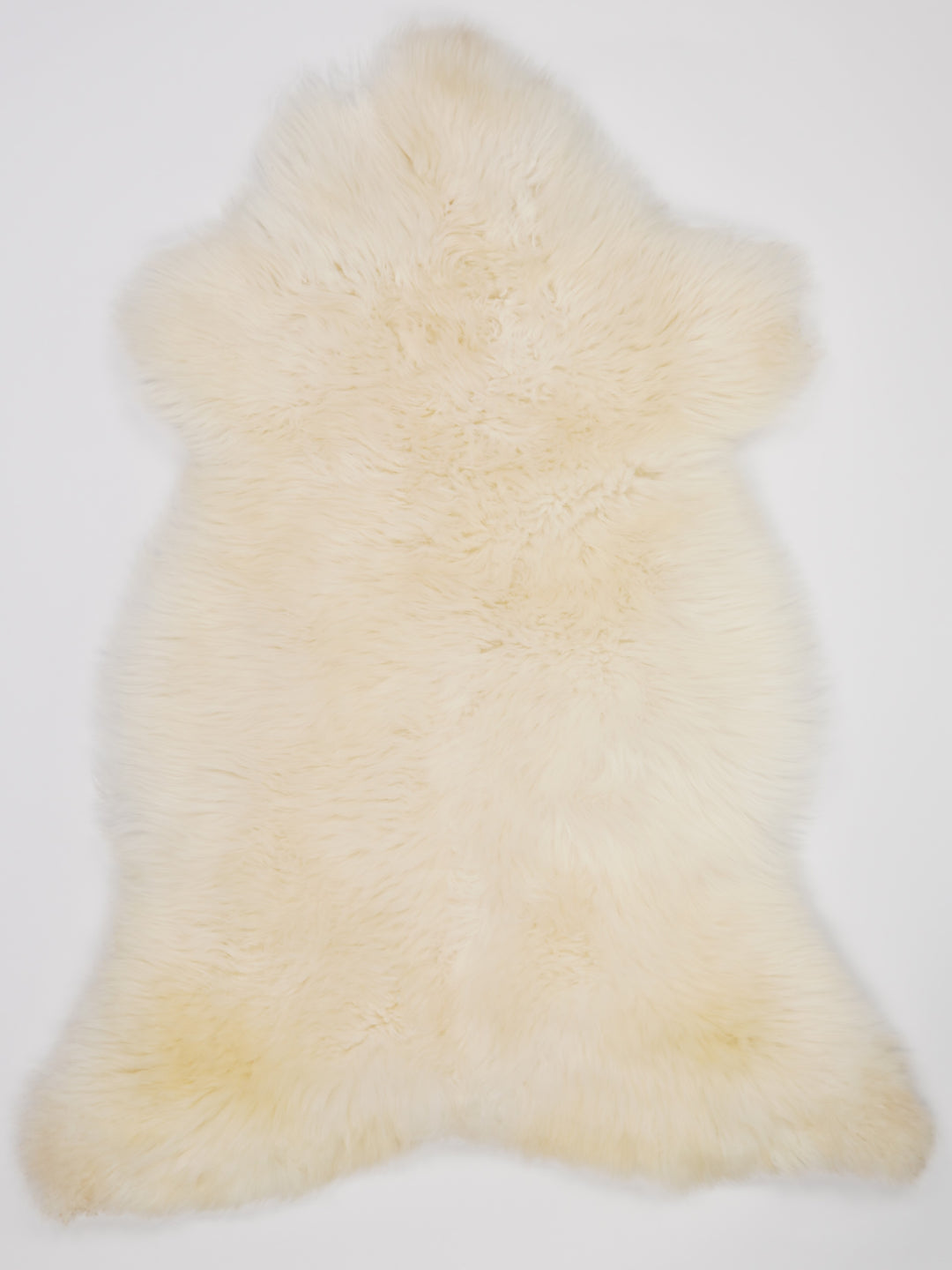 Bílá skandinávská ovčí kůže L