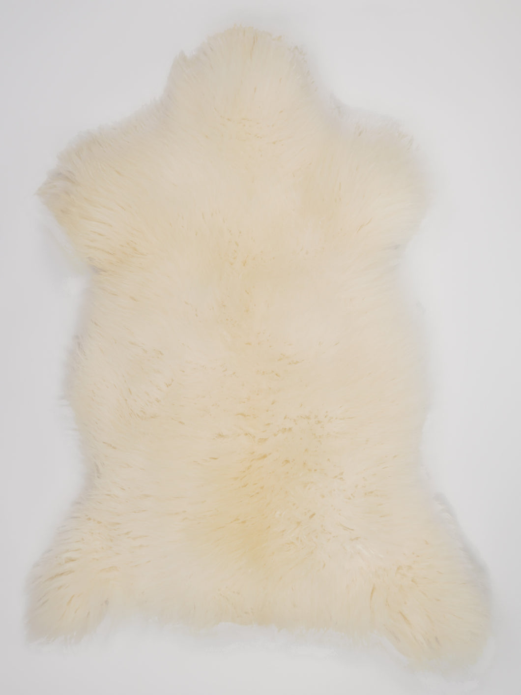 Bílá ovčí kůže L