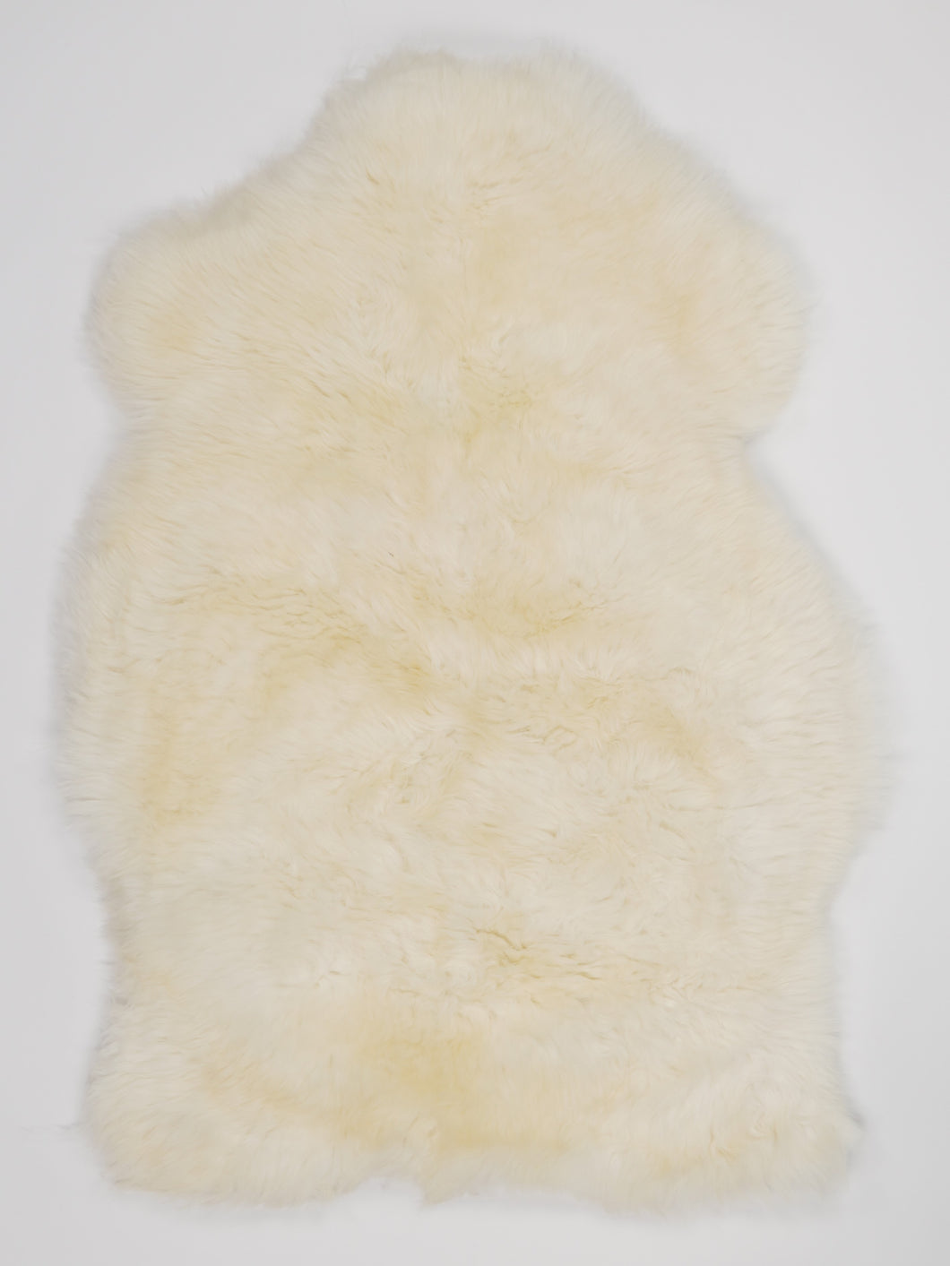 Bílá ovčí kůže M