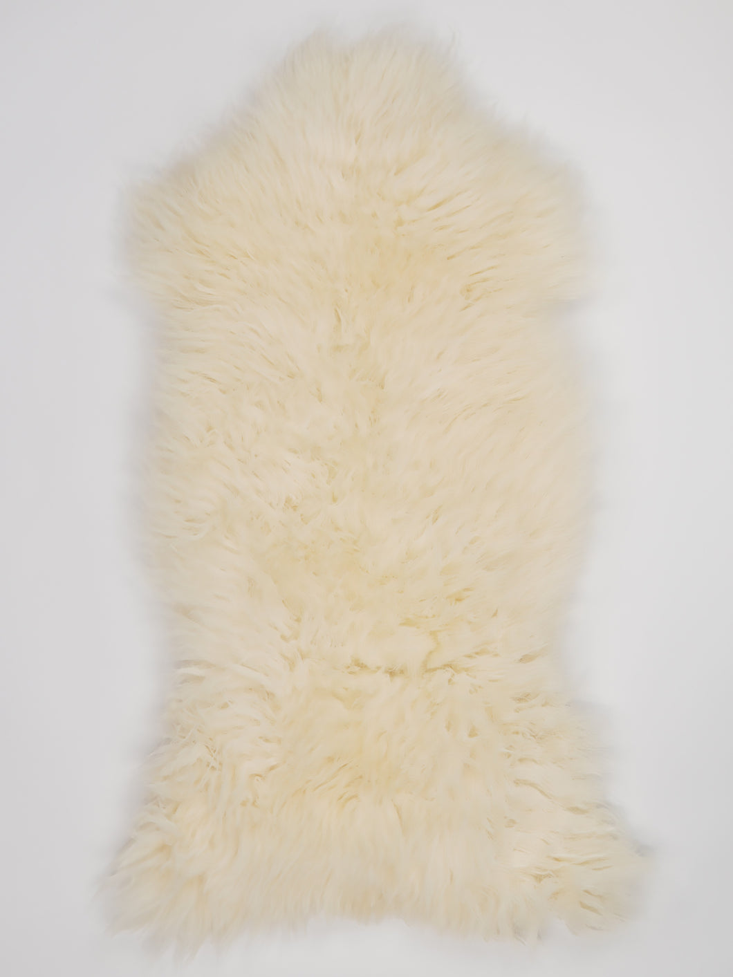 Bílá ovčí kůže L