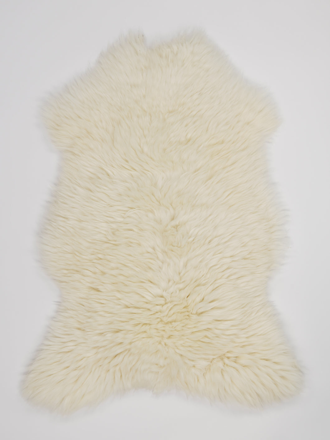 Bílá ovčí kůže M