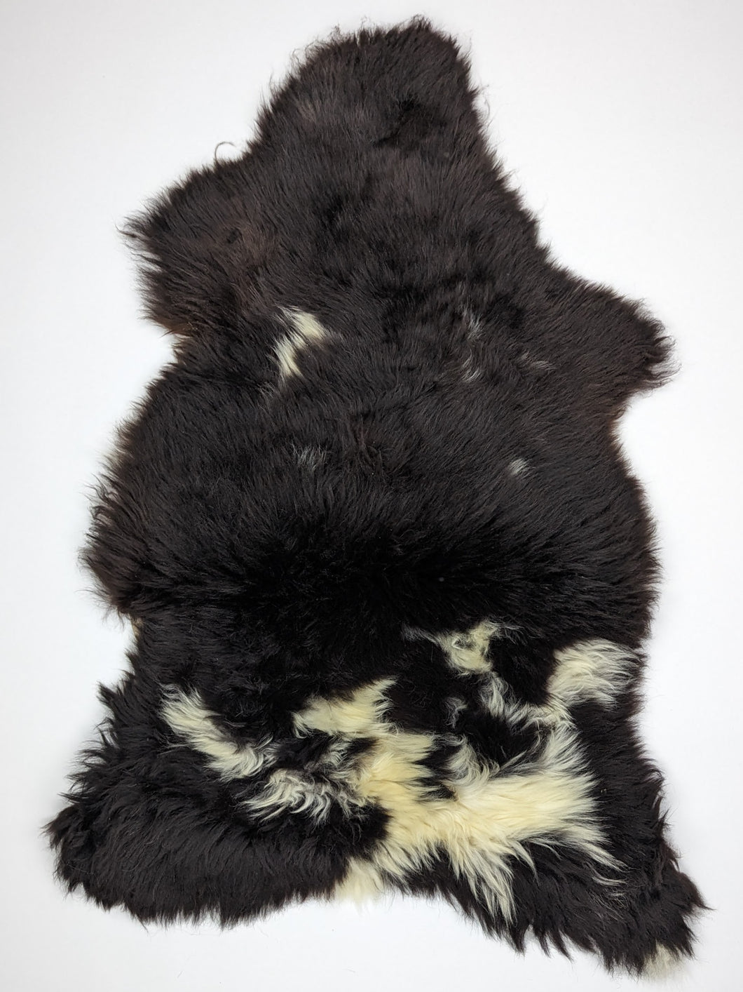 Vícebarevná ovčí kůže L