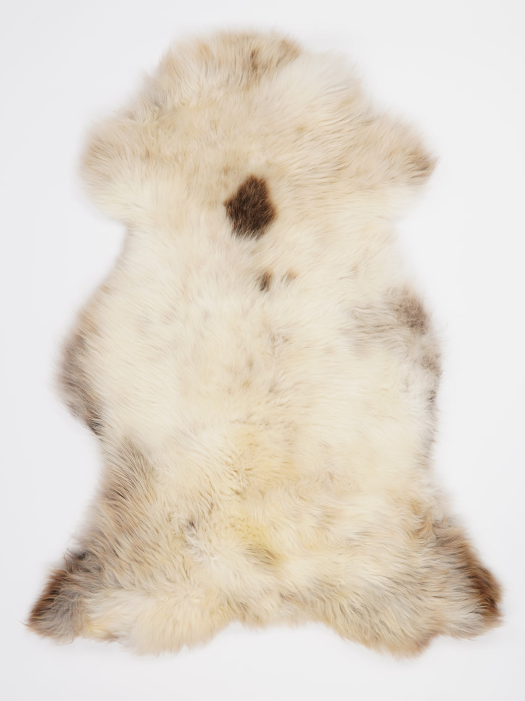 Vícebarevná ovčí kůže L