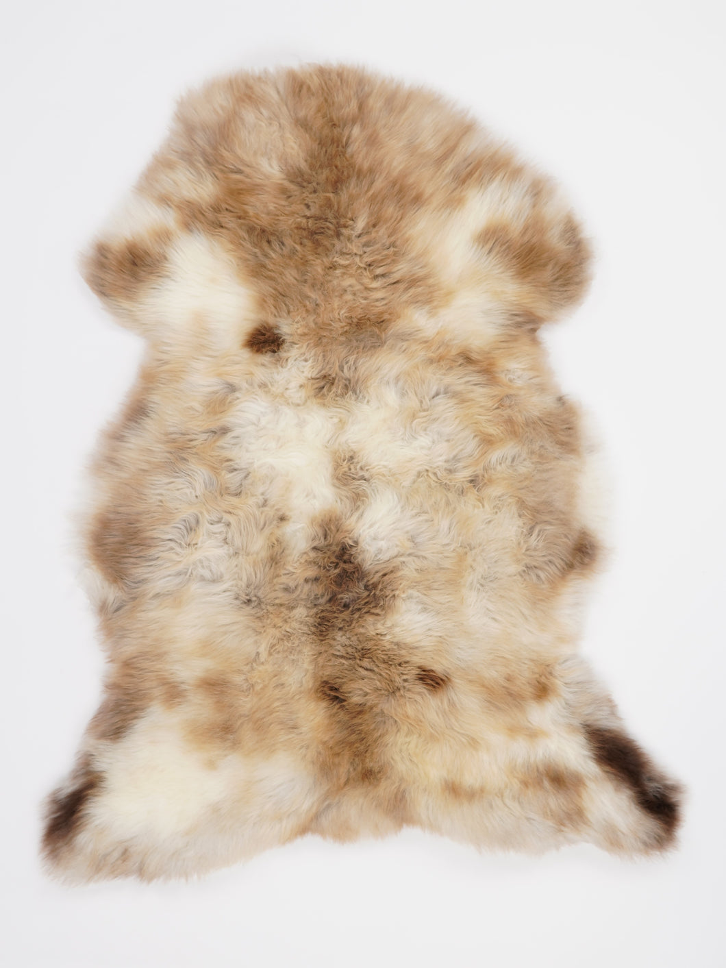 Vícebarevná ovčí kůže L