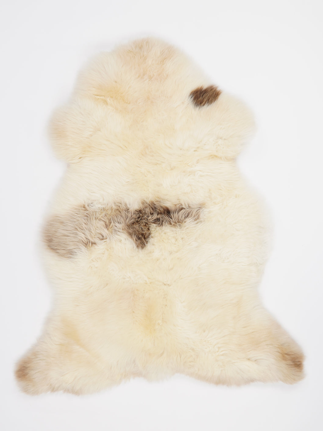 Vícebarevná ovčí kůže L